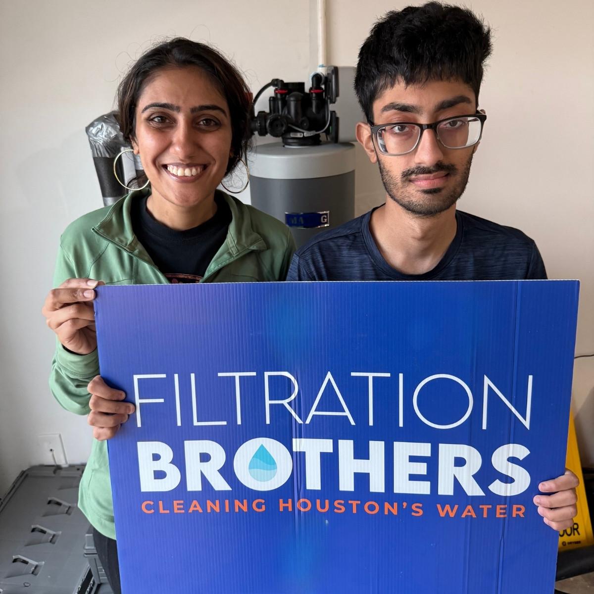 Shroff family with their new Maytag water filtration system